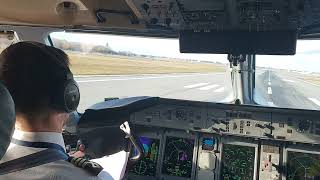 Dash 8 Q400 cockpit landing in Warsaw WAW gusty wind [upl. by Erida]