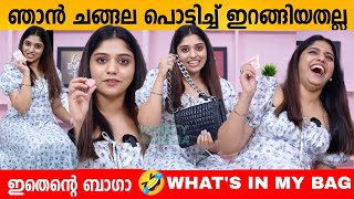 ഞാൻ ചങ്ങല പൊട്ടിച്ച് ഇറങ്ങിയതല്ല ഇതെന്റെ ബാഗാ 🤣 WHATS IN MY BAG WITH SARANYA NANDAKUMAR [upl. by Eineg]