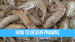 How to devein shrimpprawns with shell and head on [upl. by Saffier]