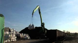 SENNEBOGEN  Port Handling 850 Material Handler loading big packs with cement bags 12 t hook [upl. by Gathard616]