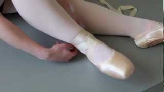 How To Tie Pointe Shoe Ribbons [upl. by Mairhpe105]