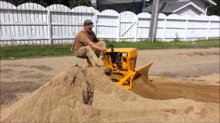 CAT Mini Dozer Pushing Dirt [upl. by Ayam689]