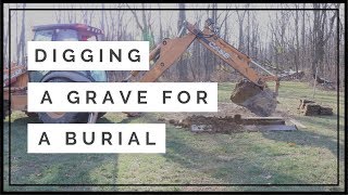 Digging a grave for a burial at a cemetery [upl. by Ecenahs]