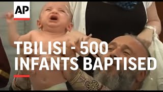 500 infants baptised in mass Orthodox ceremony [upl. by Yrroc]