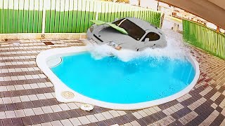 Car Crashes into Pool [upl. by Elehcar465]