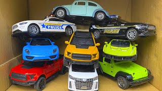 Box Full of Diecast Cars  Toyota Tesla Rolls Royce Nissan Police Bus Yaris Lamborgini VW [upl. by Bachman]