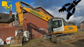 House Demolition with modern hydraulic excavator LIEBHERR 926 tearing down old house 1 [upl. by Enilatan159]