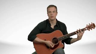 How To Hold An Acoustic Guitar  Guitar Lessons [upl. by Cannice]