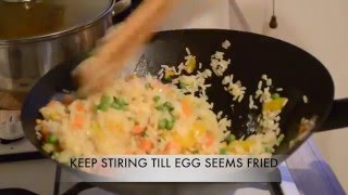 TOSIN COOKS EGG FRIED RICE [upl. by Sluiter]