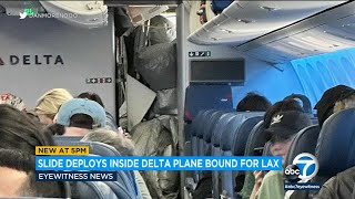 Emergency slide on Delta plane heading to LA accidentally deploys [upl. by Ecirtam]