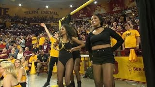 Fans Dress as Beyonce and Backup Dancers to Distract Rival Basketball Team [upl. by Ellirpa587]