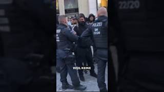 Handschlag Antifa vs Umarmung Montagsspaziergang mit der Polizei Leipzig [upl. by Oilicec803]