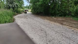 Rolling A Crushed Concrete Driveway [upl. by Airasor]