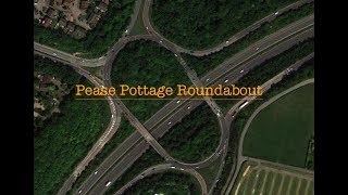 Turning Right at Pease Pottage Roundabout Large roundabout near Motorway [upl. by Annawad]