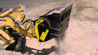 MBL Crusher Bucket working on a backhoe loader [upl. by Ojeibbob]