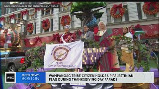 Wampanoag tribe citizen holds up Palestinian flag during Thanksgiving Day Parade [upl. by Bartle]