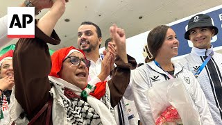 WATCH Palestinian Olympics team met with cheers in Paris [upl. by Amzu]