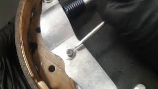 Technique to remove parking brake lever horseshoe clip from brake shoe [upl. by Rose]