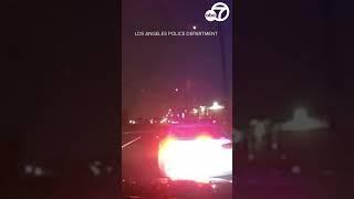 Suspect armed with machine gun fires on 2 LAPD officers  shorts [upl. by Sudderth94]