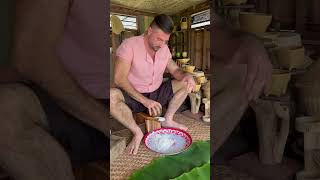 Ancient way of grating coconut youtubeshorts [upl. by Karolyn]