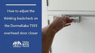 Tool Box Talks How to Adjust the Thinking Backcheck on the Dorma TS93 Overhead Door Closer [upl. by Karlise]