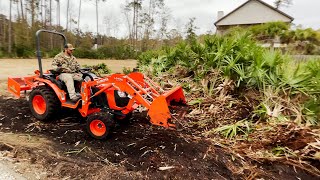 Digging Palmettos with a compact tractor [upl. by Bolt]