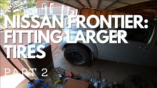 Lifting the Nissan Frontier  Part 2 Fitting larger tires trimming and melt mod [upl. by Gilda]