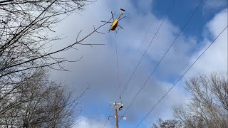 Helicopter Lineman working on high power electrical lines [upl. by Kristin]