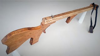 wooden slingshot with springloaded trigger [upl. by Kcirdorb496]