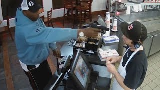 Watch Unfazed Cashier Keep His Cool During Terrifying Gunpoint Robbery [upl. by Acilef]