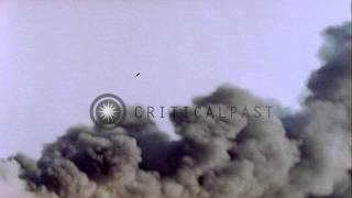 USS Ommaney Bay CVE79 burns at sea off shore of Luzon Philippines following aHD Stock Footage [upl. by Nywles]