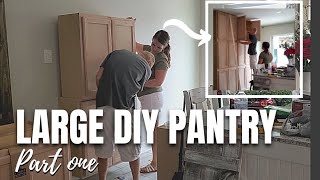 DIY PANTRY  PANTRY WALL  USING UPPER CABINETS TO MAKE A LARGE PANTRY CABINET [upl. by Ylhsa807]