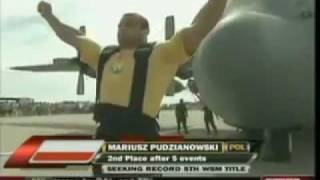 Mariusz Pudzianowski pulling an US Force Airplanemp4 [upl. by Aremahs]