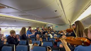 Entertaining airline passengers at 35000 feet  Ayrshire Fiddle Orchestra  Dashing White Sergeant [upl. by Aztinaj]