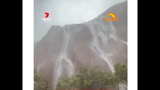 FRIDAY FUN  AUSSIE TOURISTS GOT TREATED TO THE RARE ULURU AYERS ROCK WATERFALL [upl. by Joshia]