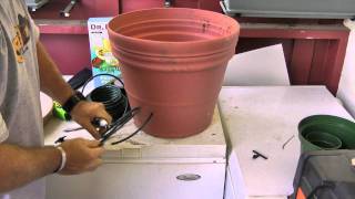 A cost effective selfwatering plant system [upl. by Keelia]