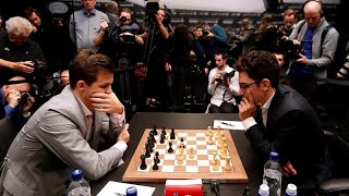 Échecs  Magnus Carlsen garde sa couronne [upl. by Ellennahs]