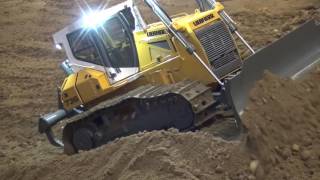 Liebherr PR736 pushing dumper loads [upl. by Ahselak234]