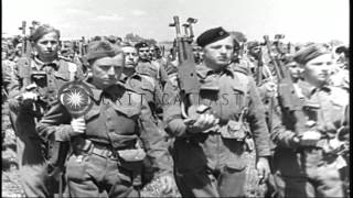 The Yugoslav Partisans dressed in uniforms march during World War II HD Stock Footage [upl. by Enidlareg]