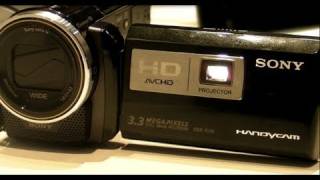 Camcorder mit Beamer Der Sony HDRPJ10 auf der CES 2011 [upl. by Ainiger244]