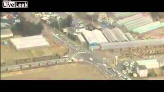 Aerial view of tsunami striking Sendai Japan [upl. by Neeloj]