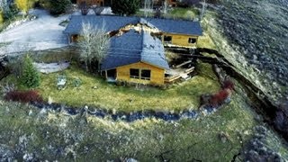 Wyoming landslide splits home in two creeps towards resort town [upl. by Ahsemrak]