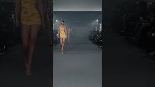 Gigi Hadid walking for Vetements with her DHL tape dress in Paris Fashion Week So cool [upl. by Shandra]