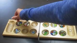 How to play Mancala [upl. by Aissirac]