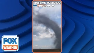 Massive Landspout Tornado In Alberta Canada [upl. by Hniv]