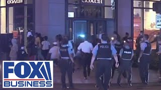 Rioting and looting rocks Chicago following policeinvolved shooting [upl. by Aihsena]