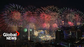 New Years 2024 Bangkok Thailand rings in New Year with riverside fireworks [upl. by Shanks423]