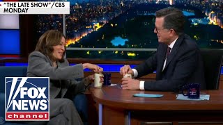 Harris cracks a beer with Stephen Colbert as millions flee Hurricane Milton [upl. by Oinotla966]