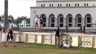 Tourists dance near the mosque [upl. by Odine]