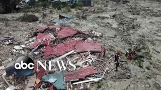 More than 1400 dead thousands injured after Indonesia quake [upl. by Htenywg851]